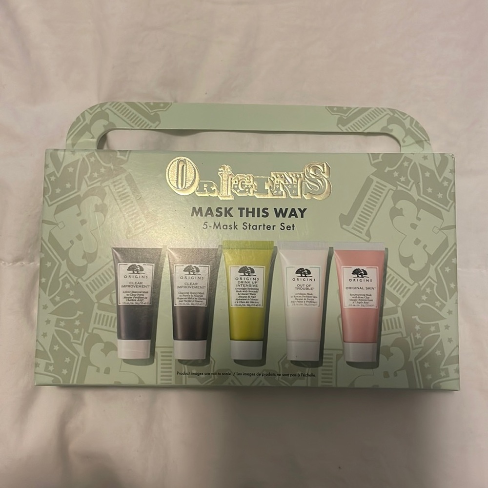 Unopened brand new origins 5- piece mask set